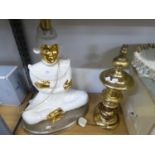 A LARGE WHITE AND PART GILT TABLE LAMP IN THE FORM OF AN ORIENTAL FEMALE FIGURE SEATED IN A LOTUS