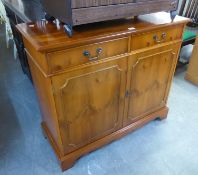 GEORGIAN STYLE YEW-WOOD SIDE CABINET, WITH TWO COCKBEADED SHORT FRIEZE DRAWERS OVER TWO DOORS, ON