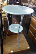 A CIRCULAR OCCASIONAL TABLE WITH GREY METAL FRAME AND FROSTED GLASS CIRCULAR TOP AND UNDERSHELF