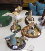 A COLLECTION OF RESIN ANIMALIER GROUPS, including Country Artists barn owl, 'Howling Wolf (