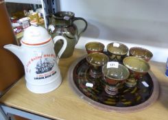 ROOKES POTTERY STONEWARE SET WITH LARGE JUG, SIX GOBLETS AND 'THE LARGEST SAILING SHIP OF WORLD'