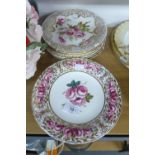 A SET OF TWELVE COALPORT CHINA 'CELEBRATION OF COALPORT ROSES’ LIMITED EDITION CABINET PLATES