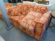A LOUNGE SUITE OF 3 PIECES, COVERED IN RED FABRIC, EMBOSSED WITH WHITE ORIENTAL CHARACTERS, VIZ, A