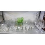 A QUANTITY OF CUT AND PLAIN DRINKING GLASSES, STEM WINES AND TUMBLERS AND A CUT GLASS DECANTER