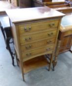 AN EDWARDIAN INLAID MAHOGANY FOUR DRAWER SHEET MUSIC CABINET