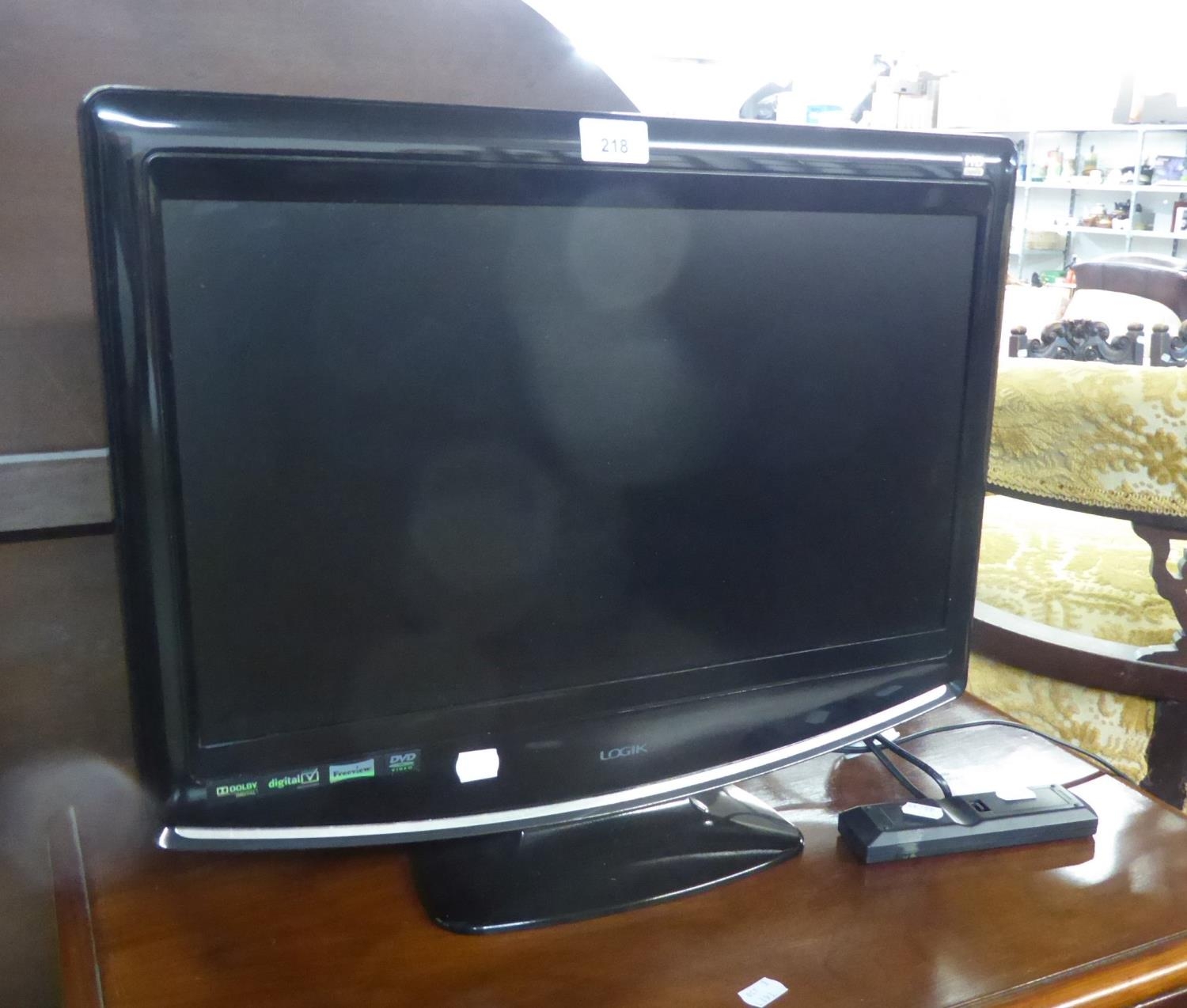 A LOGIC FLAT SCREEN 21" TELEVISION