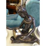 LATE 20TH CENTURY ART DECO STYLE BRONZE SCULPTURE OF AN AFRICAN FEMALE DRUMMER, 13" (33 CM) high