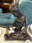 LATE 20TH CENTURY ART DECO STYLE BRONZE SCULPTURE OF AN AFRICAN FEMALE DRUMMER, 13" (33 CM) high