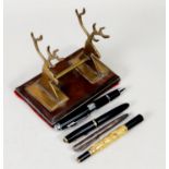 ART DECO PERIOD BRASS AND BAKELITE DESK STAND, together with Parker Duofold fountain pen, silver