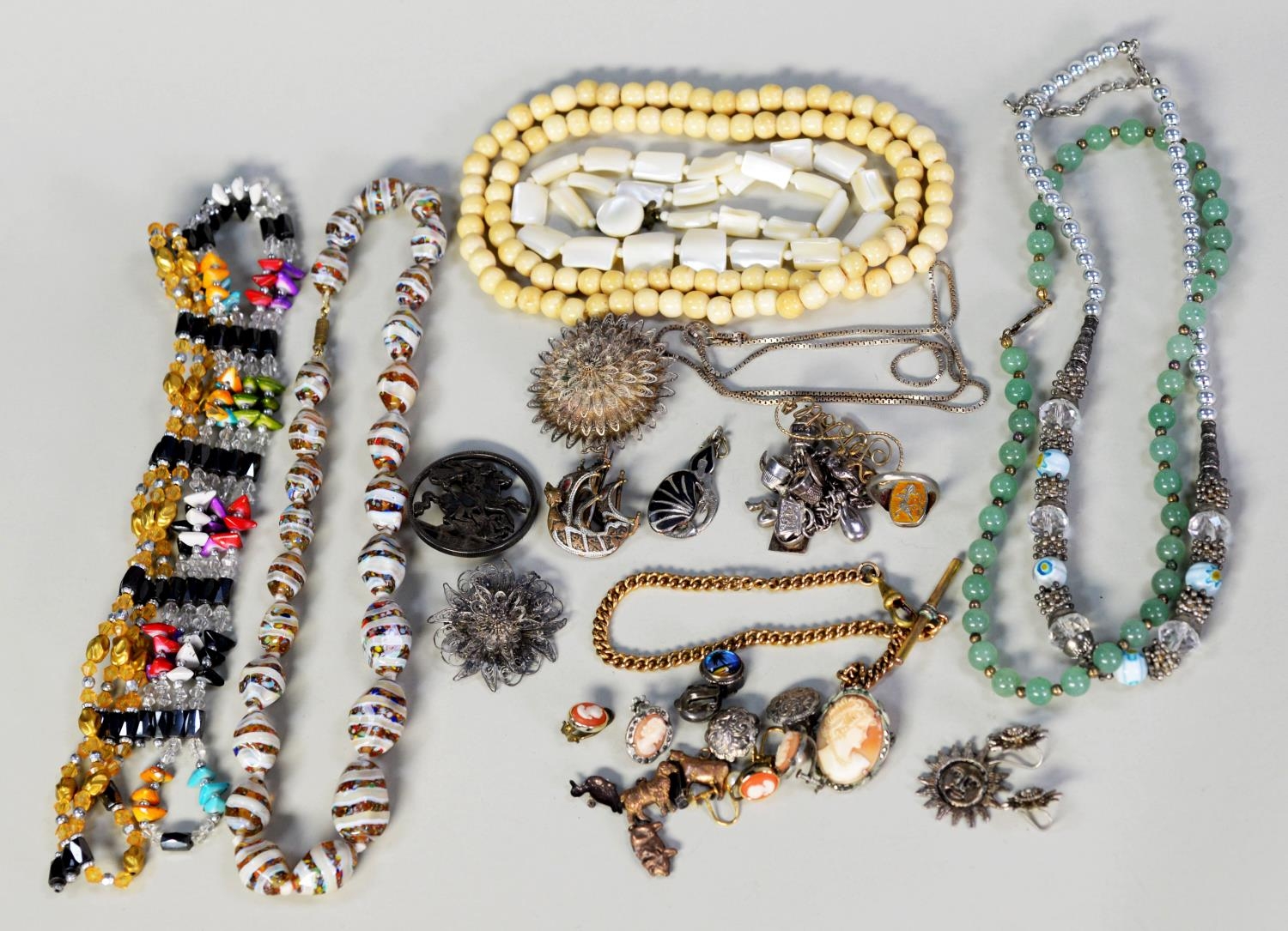 GOOD SELECTION OF COSTUME JEWELLERY INCLUDING; BROOCHES, NECKLACES AND EARRINGS, INCLUDES; NURSES