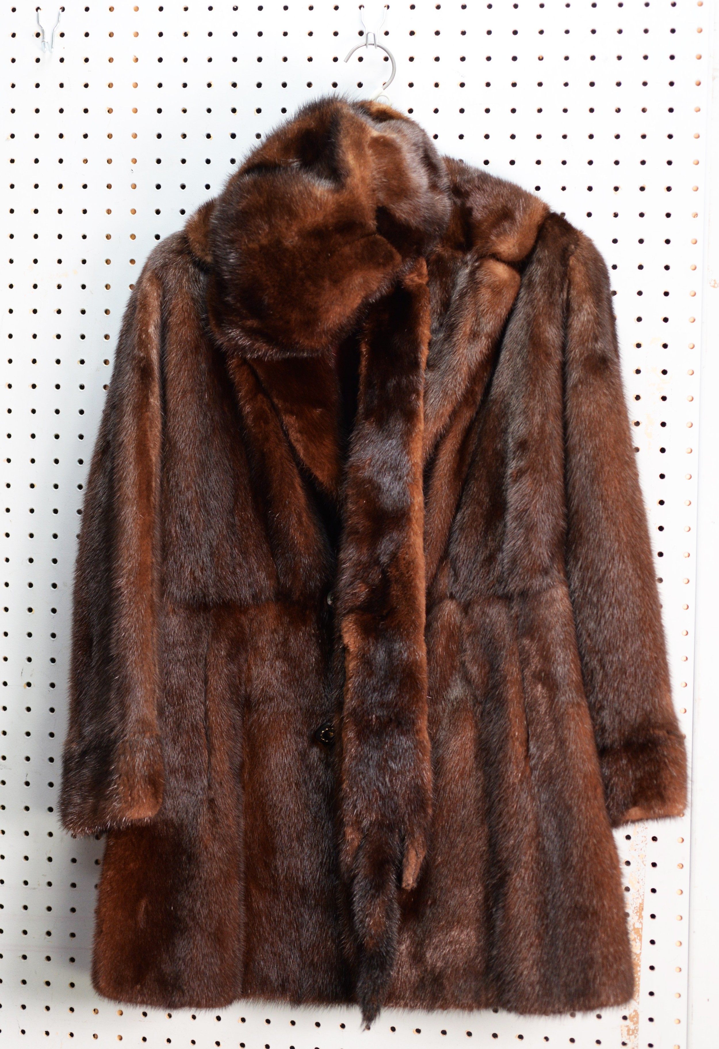 LADY'S DARK BROWN MINK THREE-QUARTER LENGTH COAT with revered collar, double breasted two button