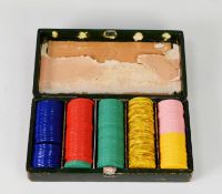 COLLECTION OF PLASTIC GAMING CHIPS, in dark green morocco fitted box