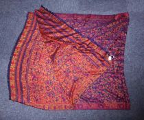 PAISLEY SHAWL WITH ALL-OVER CLOSE FLORAL AND FOLIATE DESIGN, on a midnight blue field, narrow red