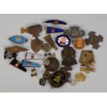 APPROXIMATELY 26 SMALL GILT METAL AND ENAMELLED METAL BADGES RELATING TO THE SESQUICENTENNIAL