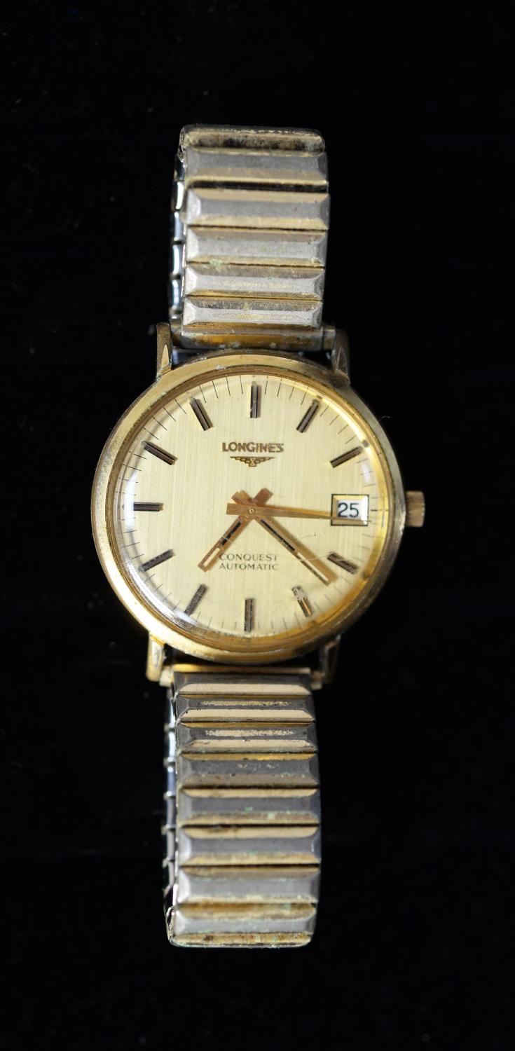 GENT'S LONGINES CONQUEST SWISS AUTOMATIC WRISTWATCH, the gold coloured dial with batons, centre