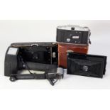 A LEATHER CASED VINTAGE PATHESCOPE MOTOCAMERA 'B' HANDHELD MOTION PICTURE CAMERA, with three extra