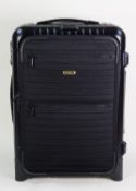 RIMOWA, GERMAN, BLACK PLASTIC CABIN BAG, with traditional ribbed decoration, zip fastening,