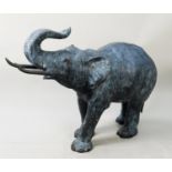 CHINESE BRONZE MODEL OF AN ELEPHANT AS A POND FOUNTAIN, the water flowing in through a back foot and