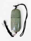 JAPANESE NINETEENTH CENTURY SINGLE CASE SHAGREEN INRO of rounded oblong and oval section, with