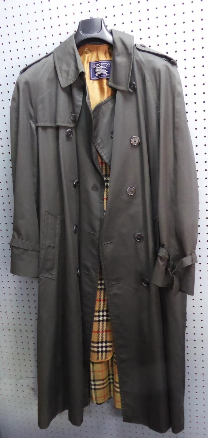 BURBERRYS MADE IN ENGLAND, GENTLEMAN'S GREY RAINCOAT, with double breasted, six button front,
