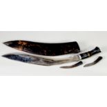 LARGE PROBABLY PRE-WAR INDIAN EXAMPLE OF A KUKRI, with plate blade and inlaid horn handle, 23" (58.