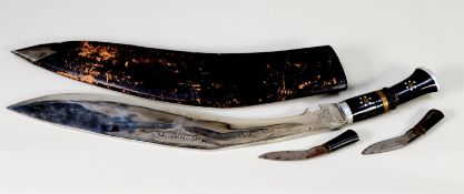 LARGE PROBABLY PRE-WAR INDIAN EXAMPLE OF A KUKRI, with plate blade and inlaid horn handle, 23" (58.