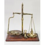 PAIR OF W & T AVERY LTD. BIRMINGHAM EARLY TWENTIETH CENTURY BANKERS PORTABLE BRASS BEAM SCALES, of