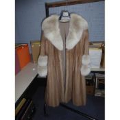 LIGHT BROWN PASTEL MINK MIDI LENGTH COAT, with grey fox fur shawl collar and fox fur deep cuffs,