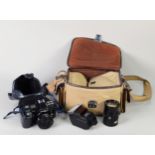 MINOLTA 7000 35MM SLR CAMERA OUTFIT, including 28mm f2.8 lens, 135mm f2.87 lens and flash unit, in