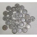 EIGHTY SIX GEORGE V SILVER FLORINS with varying degrees of wear, 30.5gms (86)