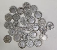 EIGHTY SIX GEORGE V SILVER FLORINS with varying degrees of wear, 30.5gms (86)