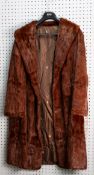 LADY'S RUSSIAN BROWN ERMINE FULL-LENGTH FUR COAT with shawl collar, single breasted front with