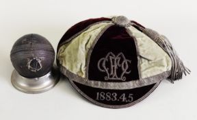 LATE NINETEENTH CENTURY INTERNATIONAL SPORT CAP, PROBABLY FOOTBALL, with monogram to the front
