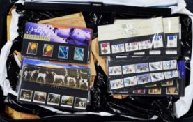 SUITCASE HOLDING A LARGE QUANTITY OF GB MINT STAMPS mainly in sheet form, face value in region of £