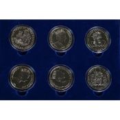 BOXED SET OF SIX ELIZABETH II CROWN COINS COMMEMORATING 100 YEARS OF PETER RABBIT