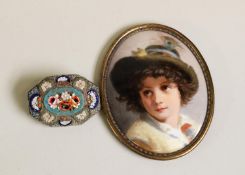 SMALL EARLY TWENTIETH CENTURY PAINTED PORCELAIN OVAL PLAQUE, HEAD AND SHOULDERS OF A BOY, in green