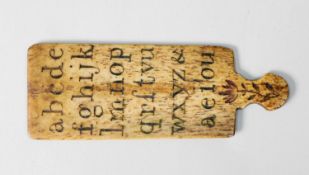 RARE EIGHTEENTH CENTURY BONE HORNBOOK OR TEACHING AID, of paddle form on each side incised with