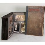 TWO EDWARDIAN POSTCARD ALBUMS CONTAINING MAINLY EMBOSSED AND OTHER BIRTHDAY WISHES/GREETINGS, mainly