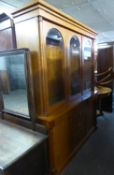 A REPRODUCTION LIGHTWOOD DINING ROOM SUITE, COMPRISING OF A LARGE DISPLAY CABINET  WITH THREE