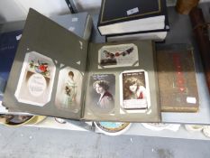 TWO EDWARDIAN POSTCARD ALBUMS CONTAINING MAINLY EMBOSSED AND OTHER BIRTHDAY WISHES/GREETINGS, mainly