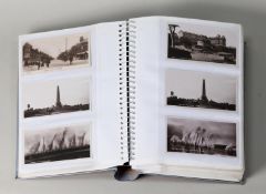 MODERN METALLIC FINISH SPIRAL BOUND PHOTOGRAPH ALBUM CONTAINING GOOD CIRCA 1920s POSTCARDS, to