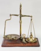 PAIR OF W & T AVERY LTD. BIRMINGHAM EARLY TWENTIETH CENTURY BANKERS PORTABLE BRASS BEAM SCALES, of