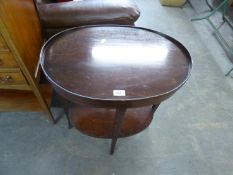 AN INLAID MAHOGANY OVAL OCCASIONAL TABLE WITH UNDER-SHELF, HAVING GALLERY TOP