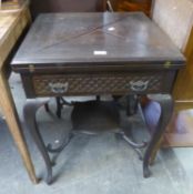 AN EDWARDIAN DARK STAINED CABRIOLE LEGGED ENVELOPE CARD TABLE