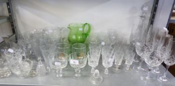 A QUANTITY OF CUT AND PLAIN DRINKING GLASSES, STEM WINES AND TUMBLERS AND A CUT GLASS DECANTER