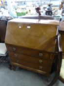 EARLY TWENTIETH CENTURY MAHOGANY BUREAU, with quarter cut fall front, three conforming drawers and