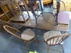 ERCOL DINING TABLE AND SIX ARCH BACK ERCOL CHAIRS