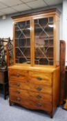 GEORGE III MAHOGANY AND SATINWOOD CROSSBANDED SECRETAIRE BOOKCASE, he moulded cornice above a pair