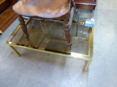 A RECTANGULAR GILT METAL FRAMED COFFEE TABLE WITH SMOKED GLASS TOP, (L 111cm x W 60cm x H38cm)