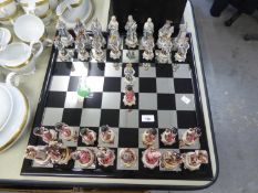 MODERN RESIN HISTORICAL FIGURES CHESS SET on mirror-effect board